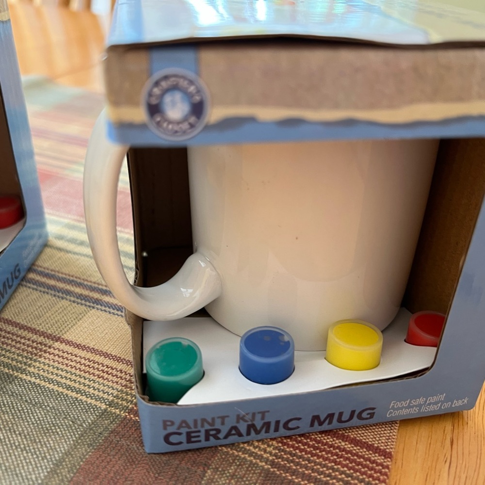 Two paint your own coffee mugs.